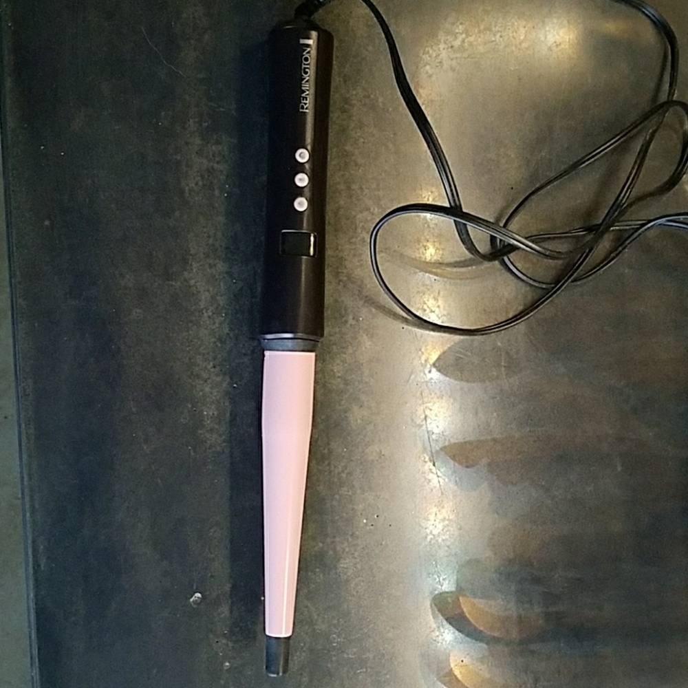 Remington clampless curling iron